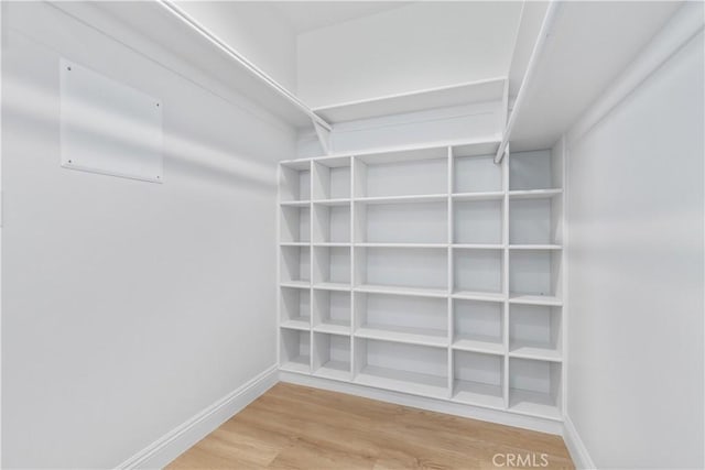 13165 N Bluffs Ct, San Miguel, CA 93451 - spacious closet featuring wood finished floors