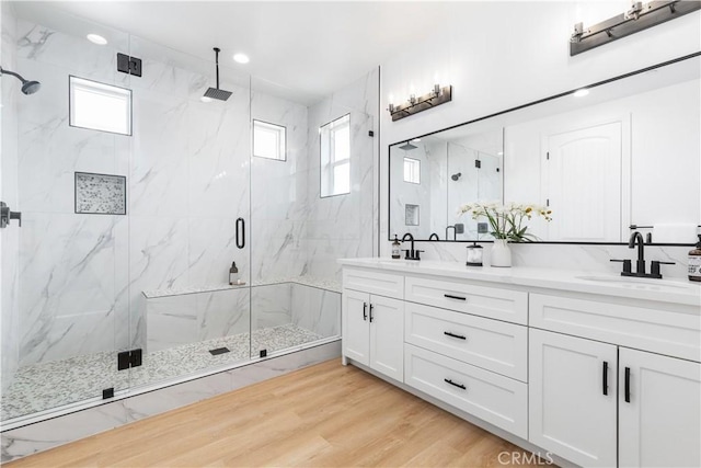13165 N Bluffs Ct, San Miguel, CA 93451 - bathroom with a marble finish shower, double vanity, healthy amount of natural light, recessed lighting, and backsplash