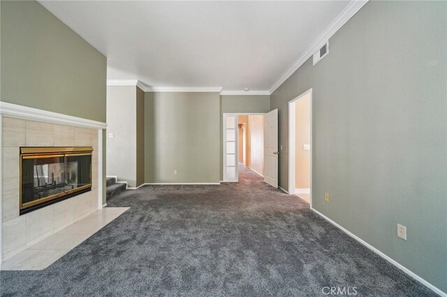 12958 Boston Ave, Chino, CA 91710 - unfurnished living room featuring ornamental molding, carpet floors, a tiled fireplace, and baseboards