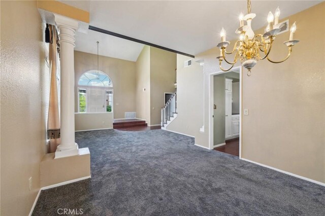 12958 Boston Ave, Chino, CA 91710 - spare room with a chandelier, dark carpet, stairs, baseboards, and vaulted ceiling