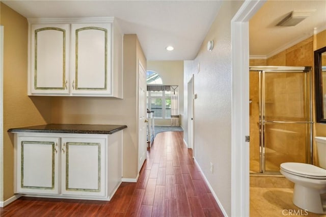 12958 Boston Ave, Chino, CA 91710 - hallway with dark wood-style floors, baseboards, a textured wall, and recessed lighting