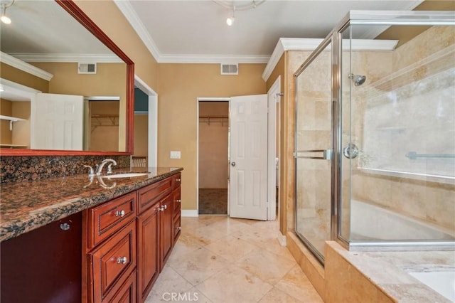 12958 Boston Ave, Chino, CA 91710 - full bath featuring a shower stall, vanity, ornamental molding, tile patterned flooring, and a spacious closet