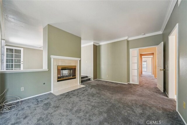 12958 Boston Ave, Chino, CA 91710 - unfurnished living room featuring carpet floors, a fireplace, ornamental molding, and baseboards