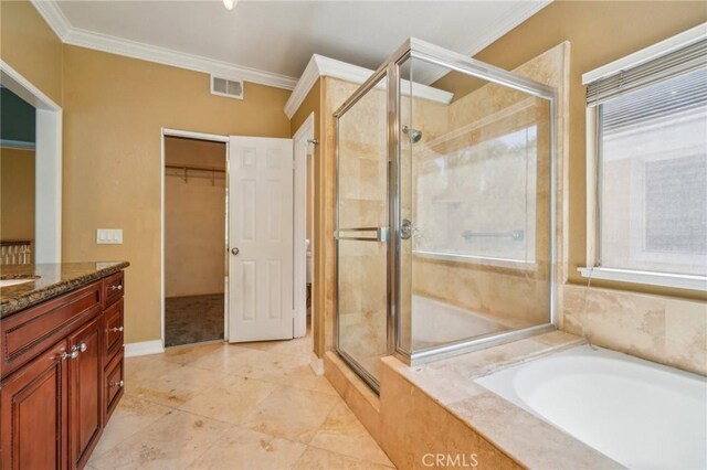 12958 Boston Ave, Chino, CA 91710 - bathroom featuring a stall shower, crown molding, a bath, a walk in closet, and vanity