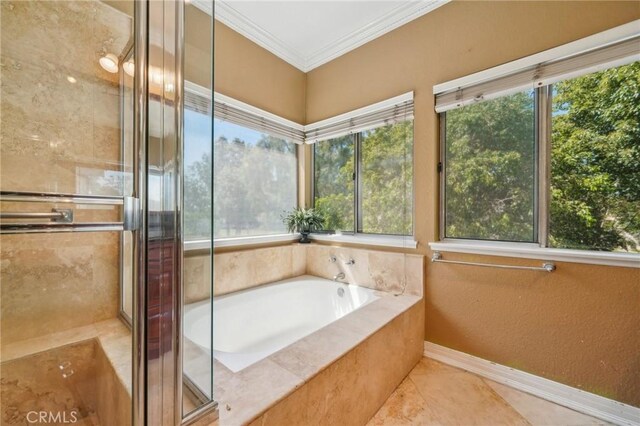 12958 Boston Ave, Chino, CA 91710 - bathroom with a garden tub, a shower stall, baseboards, ornamental molding, and tile patterned floors