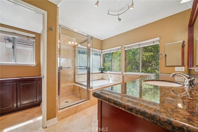 12958 Boston Ave, Chino, CA 91710 - full bathroom with a shower stall, crown molding, vanity, a bath, and tile patterned floors