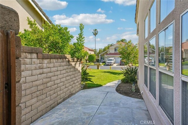 12958 Boston Ave, Chino, CA 91710 - view of patio featuring a residential view