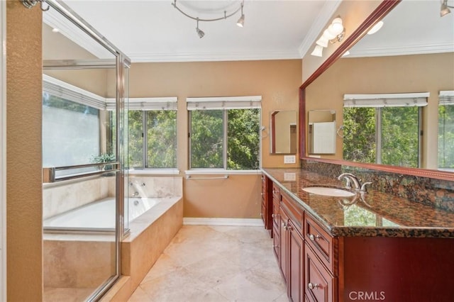 12958 Boston Ave, Chino, CA 91710 - bathroom featuring plenty of natural light, vanity, a bath, ornamental molding, and backsplash
