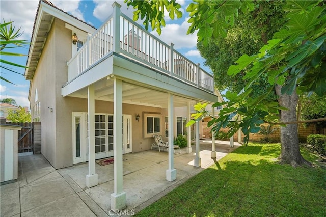 12958 Boston Ave, Chino, CA 91710 - back of property featuring stucco siding, a patio, and a balcony