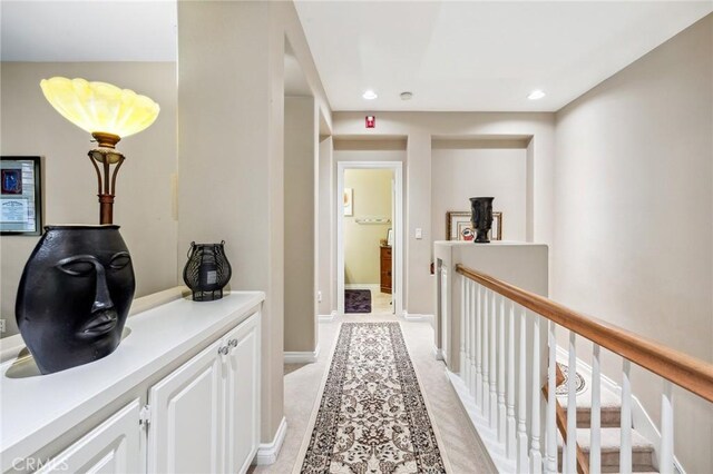23423 Abbey Glen Pl Unit 30, Valencia, CA 91354 - corridor featuring recessed lighting, baseboards, and light carpet