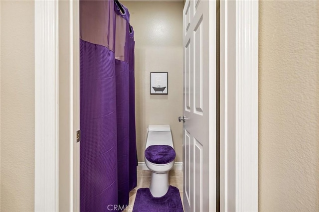 23423 Abbey Glen Pl Unit 30, Valencia, CA 91354 - bathroom featuring toilet and tile patterned flooring