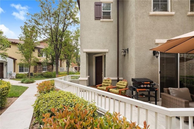 23423 Abbey Glen Pl Unit 30, Valencia, CA 91354 - view of exterior entry featuring stucco siding
