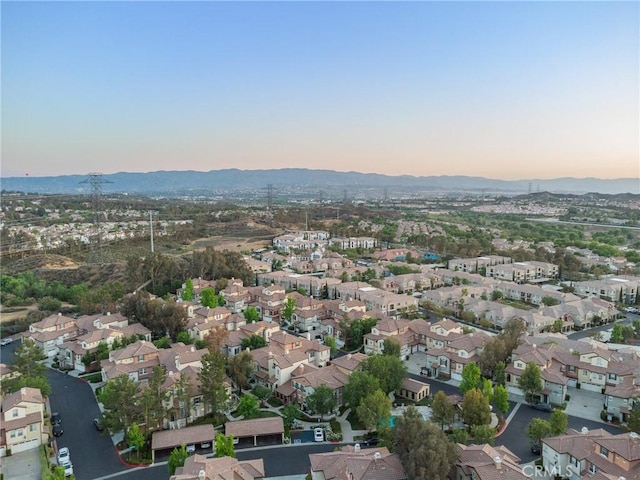 23423 Abbey Glen Pl Unit 30, Valencia, CA 91354 - aerial view of property and surrounding area with a mountainous background and nearby suburban area