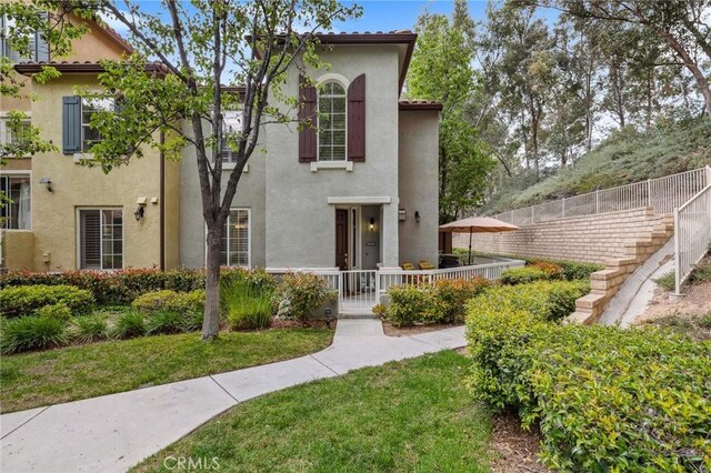 23423 Abbey Glen Pl Unit 30, Valencia, CA 91354 - mediterranean / spanish-style home featuring stucco siding