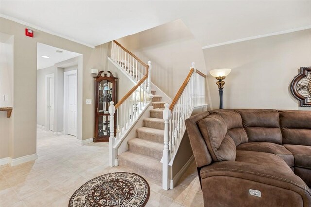 23423 Abbey Glen Pl Unit 30, Valencia, CA 91354 - staircase with crown molding, baseboards, and tile patterned floors