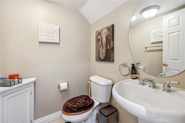 23423 Abbey Glen Pl Unit 30, Valencia, CA 91354 - half bath with a sink, vaulted ceiling, and toilet