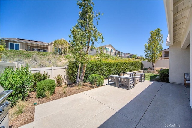 39454 Chamise St, Temecula, CA 92591 - fenced backyard featuring a patio area, outdoor lounge area, and a residential view