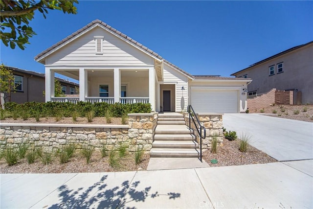 39454 Chamise St, Temecula, CA 92591 - single story home featuring a porch, driveway, an attached garage, and a tile roof