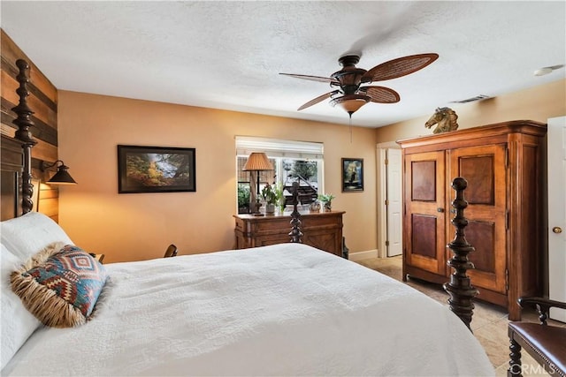 57490 Redondo St, Yucca Valley, CA 92284 - bedroom with a ceiling fan, baseboards, and a textured ceiling