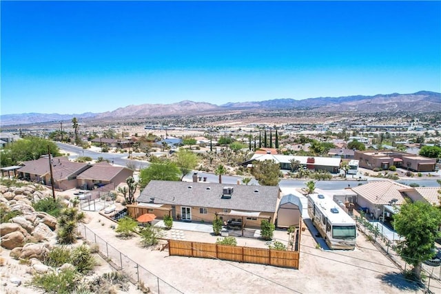 57490 Redondo St, Yucca Valley, CA 92284 - aerial perspective of suburban area featuring a mountain backdrop