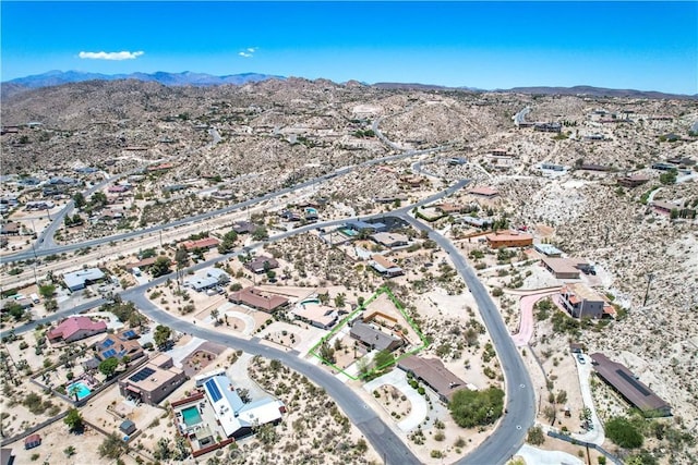 57490 Redondo St, Yucca Valley, CA 92284 - aerial view of residential area featuring a mountain backdrop and a desert landscape