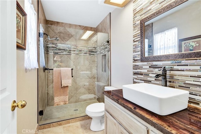 57490 Redondo St, Yucca Valley, CA 92284 - bathroom with toilet, a shower stall, tasteful backsplash, and vanity