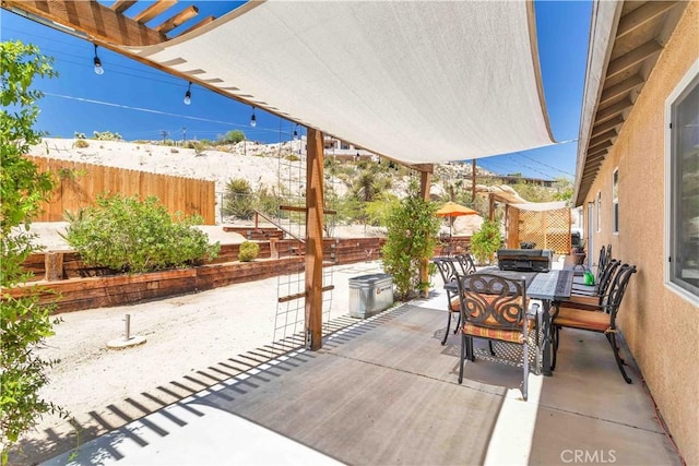 57490 Redondo St, Yucca Valley, CA 92284 - view of patio with outdoor dining space and a pergola