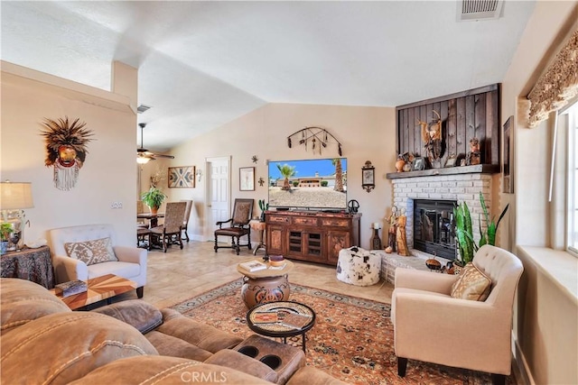 57490 Redondo St, Yucca Valley, CA 92284 - living room with ceiling fan, vaulted ceiling, a fireplace, and baseboards