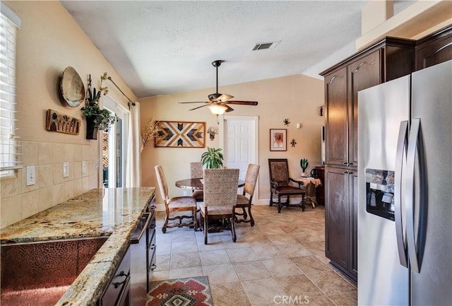 57490 Redondo St, Yucca Valley, CA 92284 - dining room with vaulted ceiling and a ceiling fan