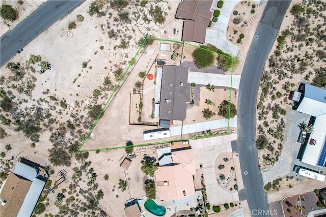 57490 Redondo St, Yucca Valley, CA 92284 - aerial view of property and surrounding area with property boundaries highlighted and a desert landscape