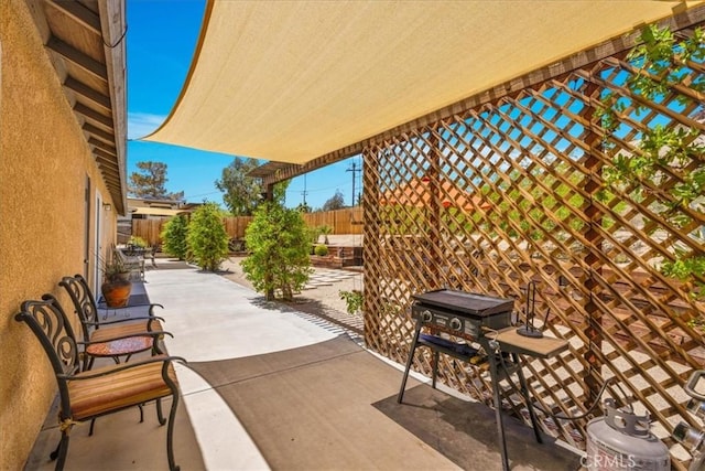 57490 Redondo St, Yucca Valley, CA 92284 - fenced backyard featuring a patio