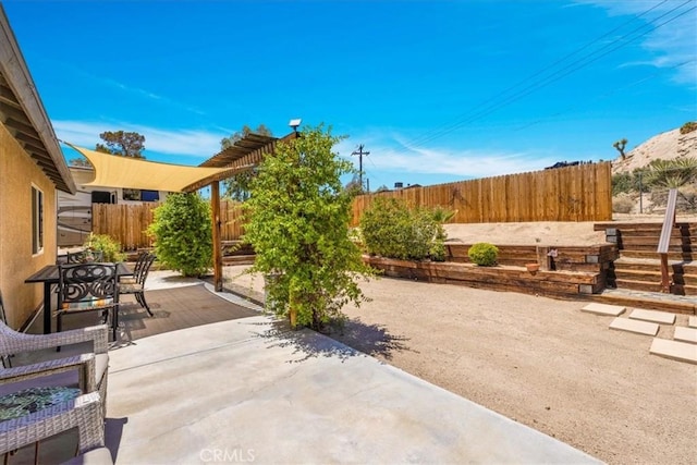 57490 Redondo St, Yucca Valley, CA 92284 - fenced backyard featuring a patio