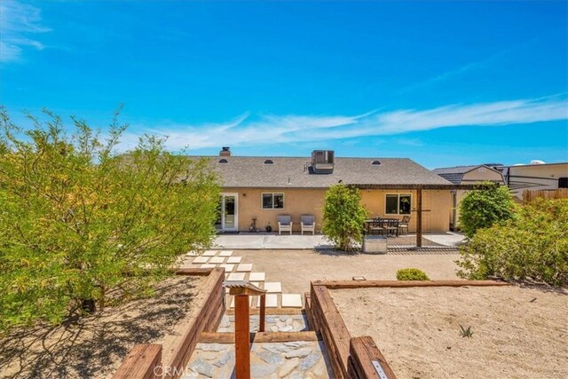 57490 Redondo St, Yucca Valley, CA 92284 - rear view of house featuring a patio and stucco siding