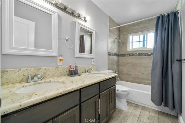 5979 Stanton Ave, Highland, CA 92346 - bathroom with toilet, shower / bath combo, wood finished floors, and double vanity