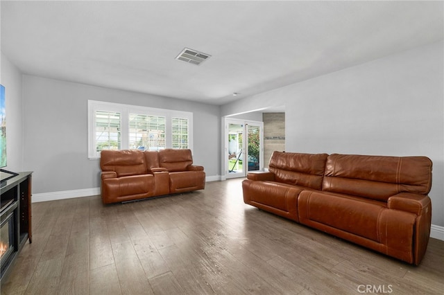 5979 Stanton Ave, Highland, CA 92346 - living area featuring baseboards and wood finished floors