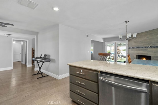 5979 Stanton Ave, Highland, CA 92346 - kitchen featuring dishwasher, baseboards, ceiling fan, light wood-style flooring, and open floor plan