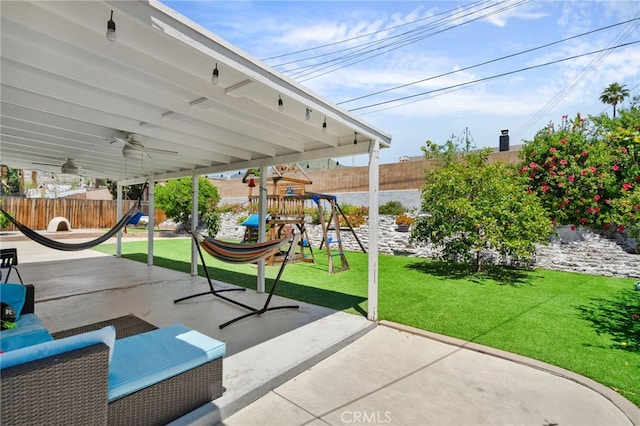 5979 Stanton Ave, Highland, CA 92346 - view of patio with a playground and ceiling fan