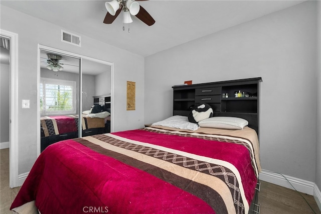 5979 Stanton Ave, Highland, CA 92346 - bedroom with baseboards, ceiling fan, a closet, and wood finished floors