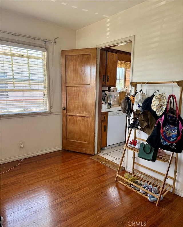 2277 Cogswell Rd, El Monte, CA 91732 - kitchen featuring dishwasher, brown cabinets, and light wood-style floors