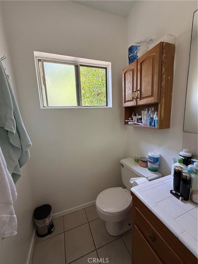 2277 Cogswell Rd, El Monte, CA 91732 - half bathroom with vanity and tile patterned floors