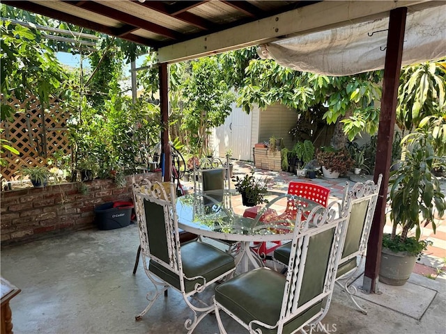 2277 Cogswell Rd, El Monte, CA 91732 - view of patio with outdoor dining space and an outbuilding