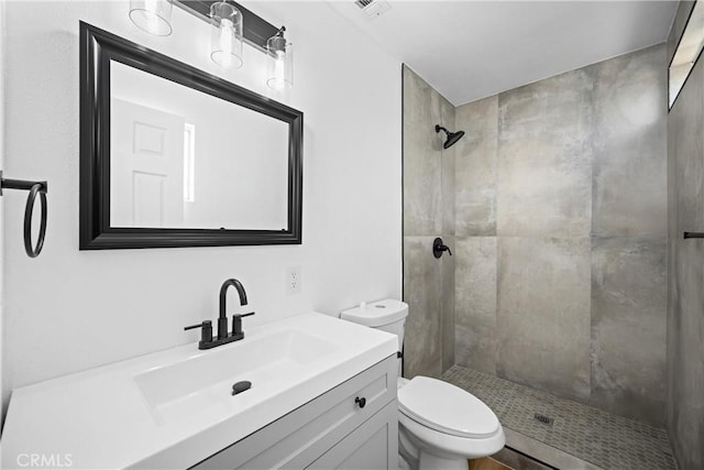 1608 Heron Ct, Redlands, CA 92374 - bathroom with toilet, vanity, and tiled shower