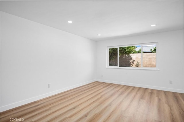 1608 Heron Ct, Redlands, CA 92374 - spare room featuring light wood finished floors, recessed lighting, and baseboards