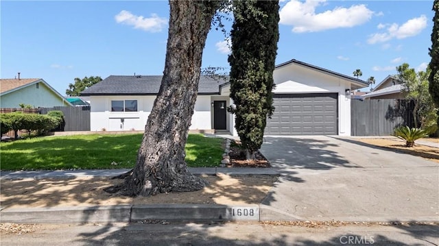 1608 Heron Ct, Redlands, CA 92374 - ranch-style home featuring driveway, a garage, and stucco siding