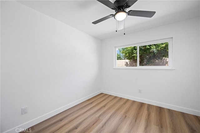 1608 Heron Ct, Redlands, CA 92374 - unfurnished room with baseboards, light wood-style floors, and ceiling fan