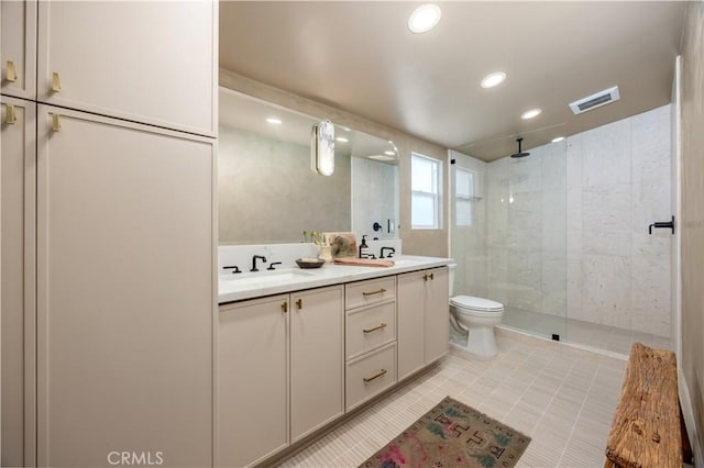 2012 Nantucket Pl, Tustin, CA 92780 - full bath featuring tiled shower, double vanity, toilet, tile patterned flooring, and recessed lighting