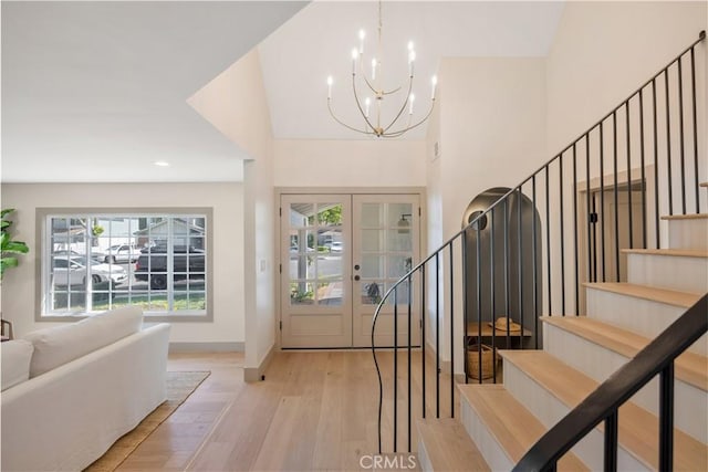2012 Nantucket Pl, Tustin, CA 92780 - foyer entrance featuring light wood-style floors, stairway, a chandelier, baseboards, and recessed lighting