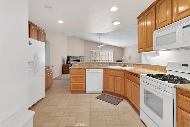 14303 Schooner Dr, Helendale, CA 92342 - kitchen with white appliances, a ceiling fan, vaulted ceiling, a peninsula, and a sink