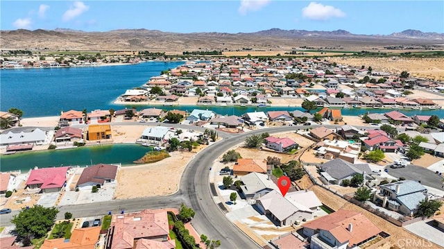 14303 Schooner Dr, Helendale, CA 92342 - aerial perspective of suburban area with a water and mountain view