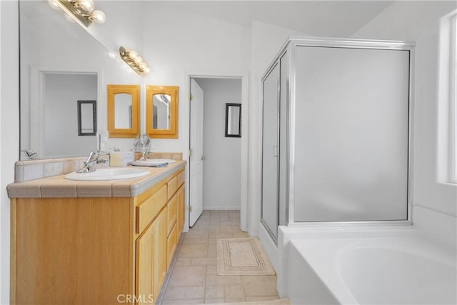 14303 Schooner Dr, Helendale, CA 92342 - bathroom with a garden tub, a shower stall, and double vanity